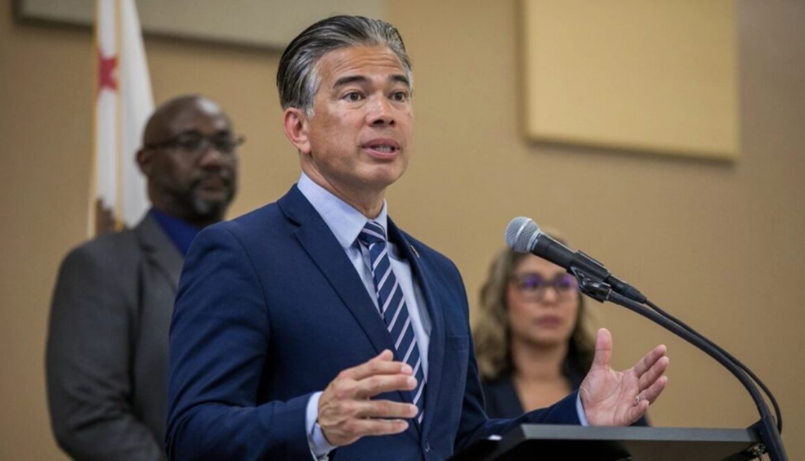 California Attorney General Rob Bonta speaking at a podium during a press conference