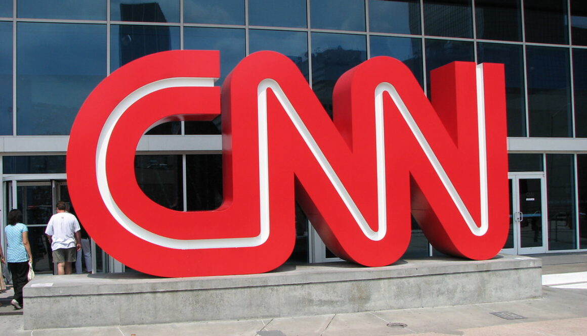 CNN logo sign outside the network's headquarters, used in coverage of CNN's copyright and trademark lawsuit against Perplexity AI.