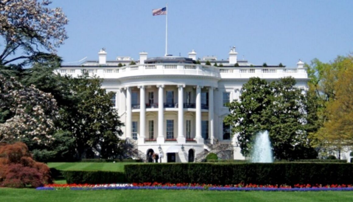 South lawn view of the White House where President Trump signed NSPM-11 on AI vendor policy in national security, June 2026.